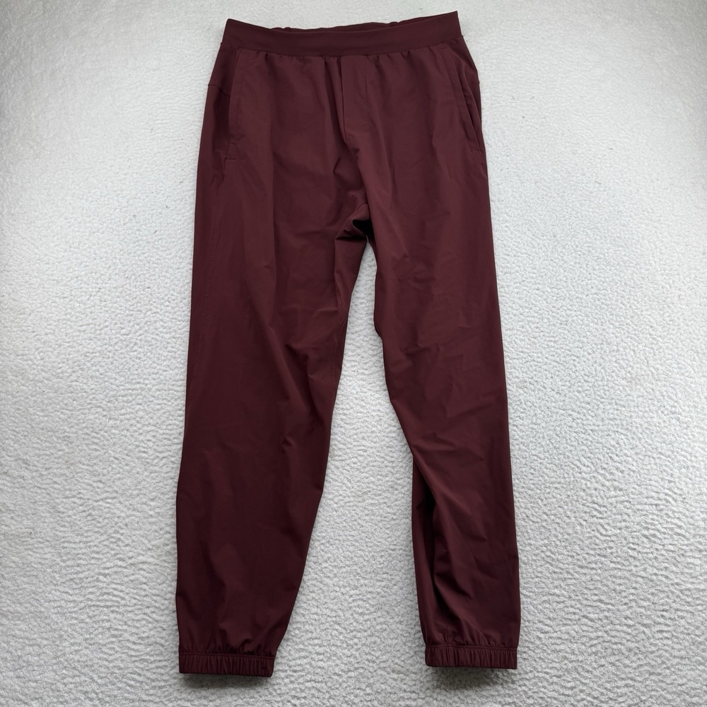 Lululemon Surge Joggers Mens Medium Maroon Tapered Zip Pockets Lightweight Gym